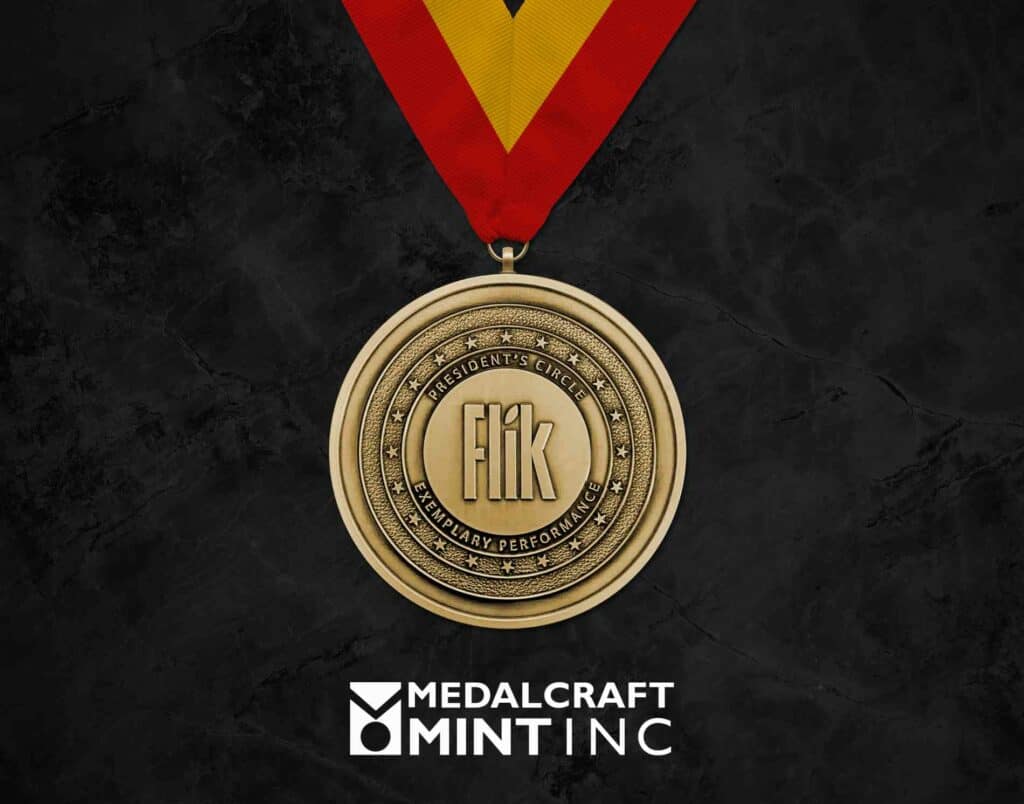 3-inch brass medal with an antique finish and neck ribbon